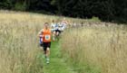 Dan Jenkin (Durham City) leads the first leg of the 4 x 1.8 mile relay at the Sunderland Open Cross Country.